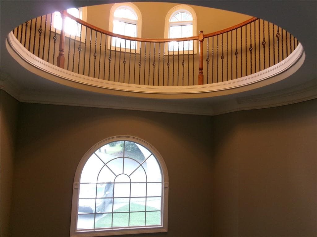 6 bedroom, 6 bathroom, 5,959 sq ft single family residence for sale at 910 Woodward Park Drive, Suwanee, GA 30024 — photo 5