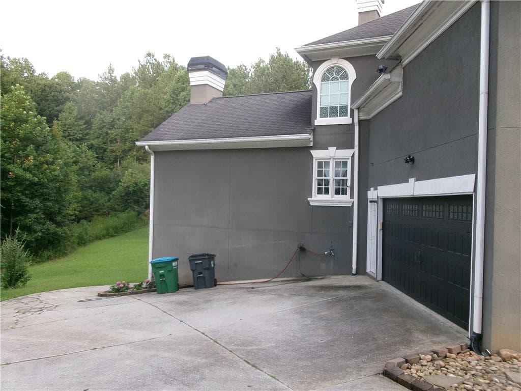 6 bedroom, 6 bathroom, 5,959 sq ft single family residence for sale at 910 Woodward Park Drive, Suwanee, GA 30024 — photo 8