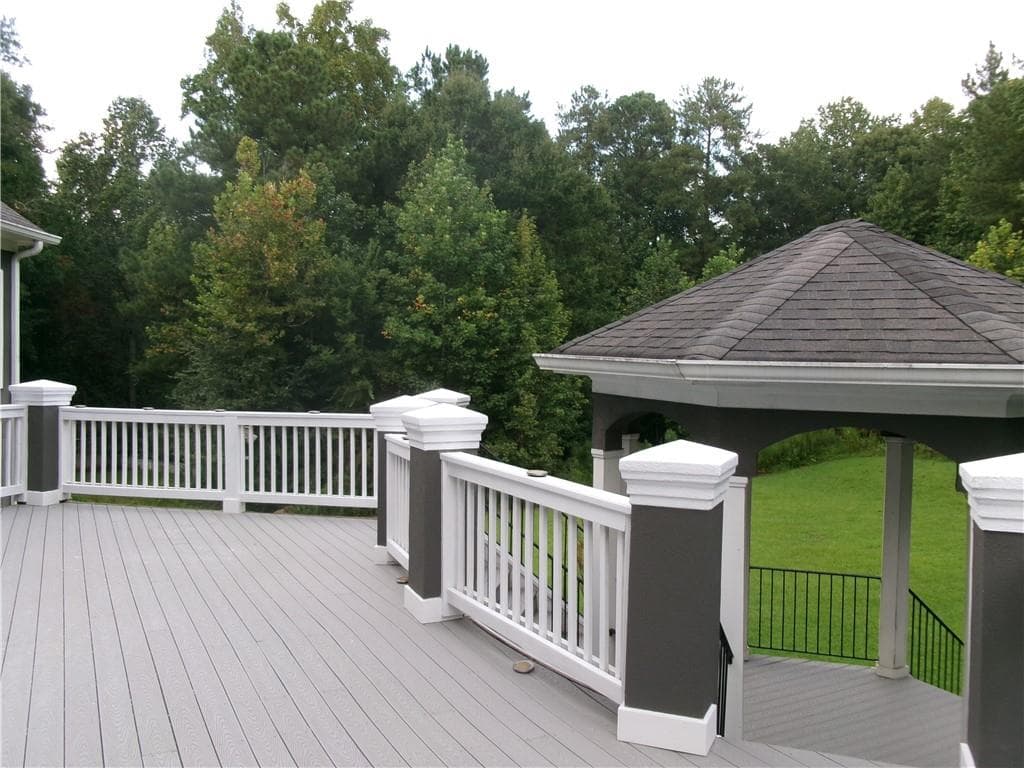 6 bedroom, 6 bathroom, 5,959 sq ft single family residence for sale at 910 Woodward Park Drive, Suwanee, GA 30024 — photo 10