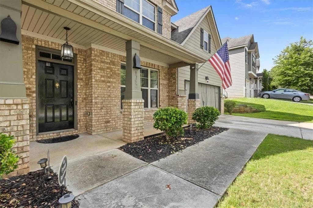 5 bedroom, 4 bathroom, 3,482 sq ft single family residence for sale at 9152 Dover Street, Lithia Springs, GA 30122 — photo 2