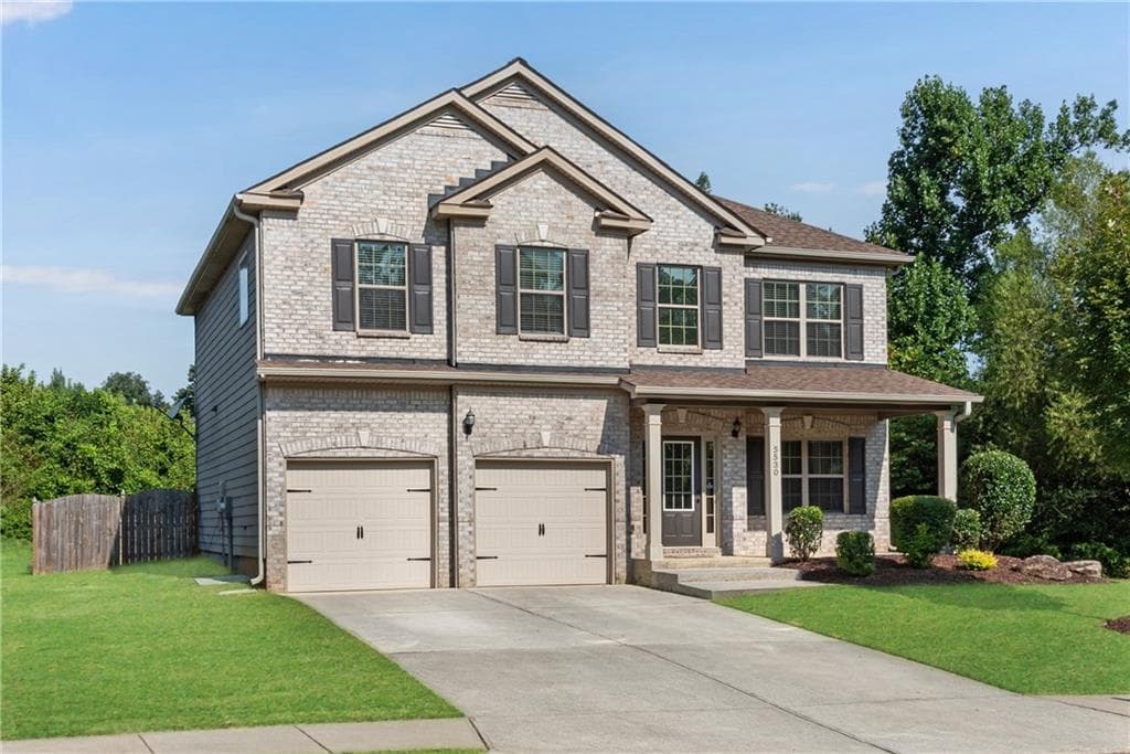 4 bedroom, 3 bathroom, 2,436 sq ft single family residence for sale at 5530 Banner Boulevard, Cumming, GA 30028 — photo 2