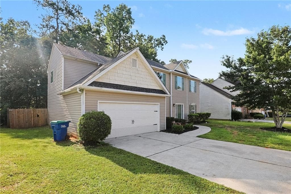 4 bedroom, 3 bathroom, 2,461 sq ft single family residence for sale at 6316 Polar Fox Court, South Fulton, GA 30296 — photo 2