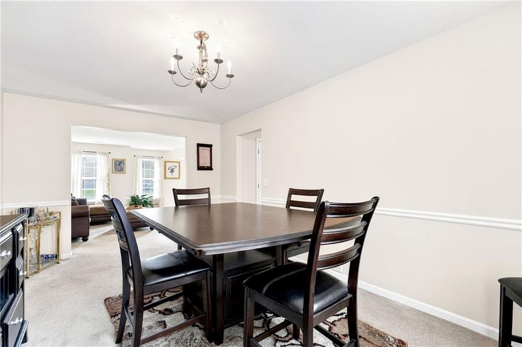 5 bedroom, 3 bathroom, 3,574 sq ft single family residence for sale at 590 Buckingham Terrace, Fairburn, GA 30213 — photo 4