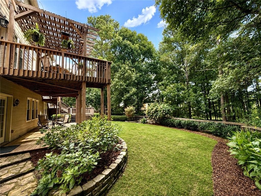 5 bedroom, 4 bathroom, 3,680 sq ft single family residence under contract at 703 Waveland Drive, Woodstock, GA 30189 — photo 2
