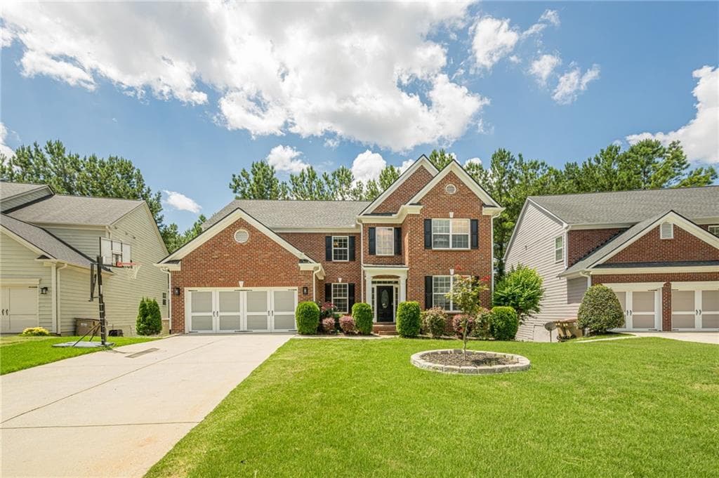 6 bedroom, 4 bathroom, 3,539 sq ft single family residence for sale at 4720 Shiloh Springs Road, Cumming, GA 30040 — photo 2