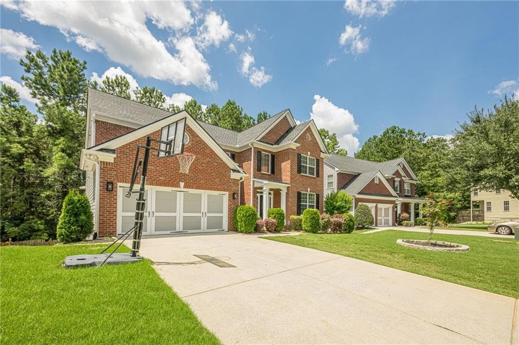 6 bedroom, 4 bathroom, 3,539 sq ft single family residence for sale at 4720 Shiloh Springs Road, Cumming, GA 30040 — photo 4