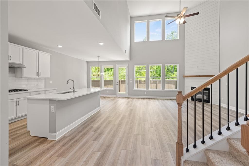 4 bedroom, 4 bathroom, 2,677 sq ft single family residence for sale at 65 Hickory Grove Lane, Hoschton, GA 30548 — photo 4