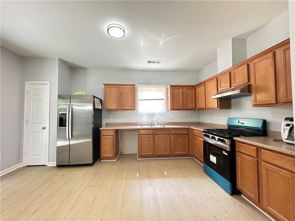 4 bedroom, 3 bathroom single family residence for rent at 2468 Worrall Hill Way, Duluth, GA 30096 for $2,500 a month — photo 6