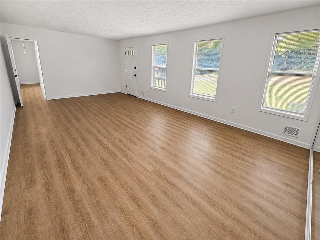 4 bedroom, 3 bathroom, 2,342 sq ft single family residence for sale at 177 Northwind Court, Lilburn, GA 30047 — photo 2