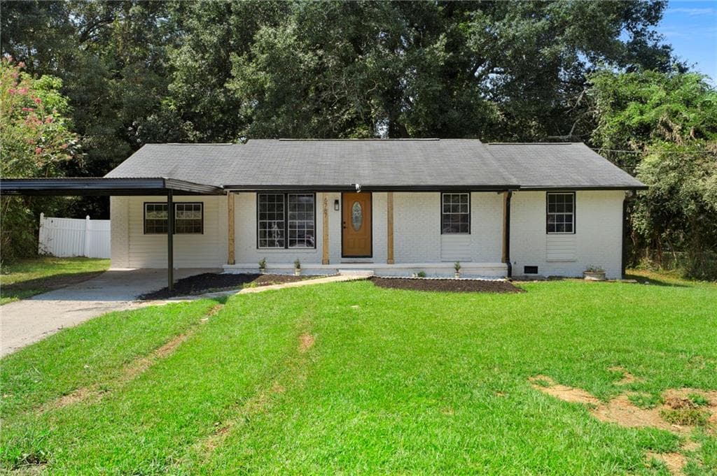 4 bedroom, 2 bathroom, 1,512 sq ft single family residence for sale at 6787 Dnae Ct, Riverdale, GA 30274 — photo 2