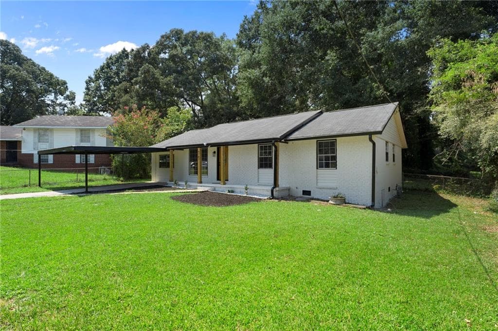4 bedroom, 2 bathroom, 1,512 sq ft single family residence for sale at 6787 Dnae Ct, Riverdale, GA 30274 — photo 4