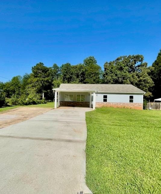 4 bedroom, 3 bathroom, 1,880 sq ft single family residence for sale at 7241 Grayson Drive, Riverdale, GA 30296 — photo 2
