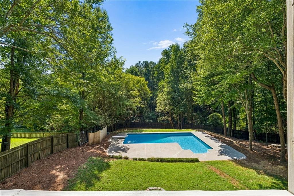 3 bedroom, 2 bathroom, 1,817 sq ft single family residence for sale at 8040 Wynfield Drive, Cumming, GA 30040 — photo 3