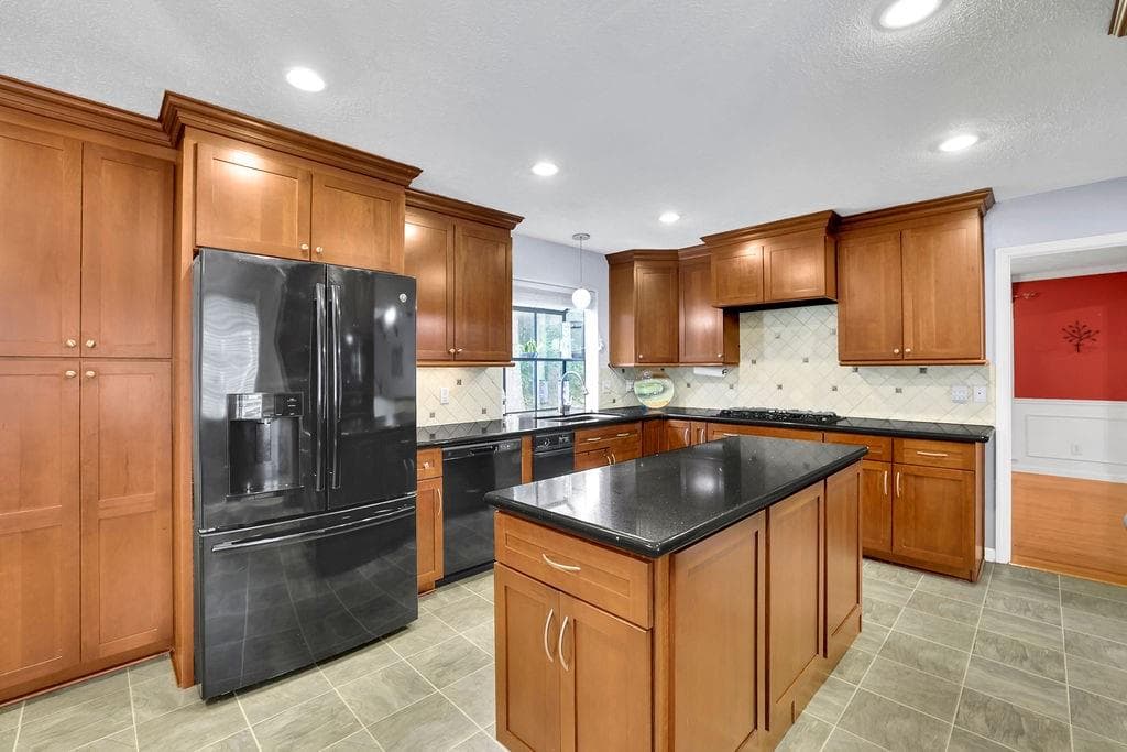 5 bedroom, 3 bathroom, 3,990 sq ft single family residence for sale at 1677 Heritage Drive, Snellville, GA 30078 — photo 4
