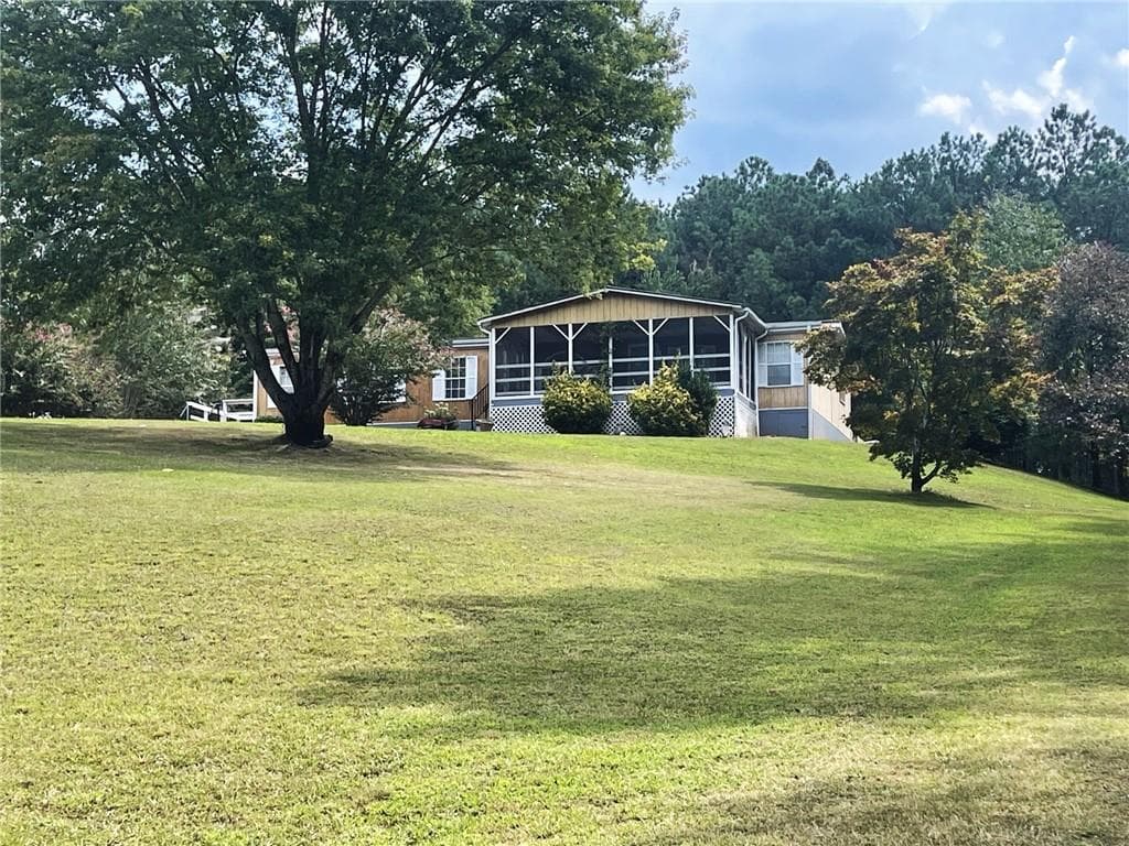 3 bedroom, 2 bathroom single family residence under contract at 74 Bridle Path Drive, Ball Ground, GA 30107 — photo 3