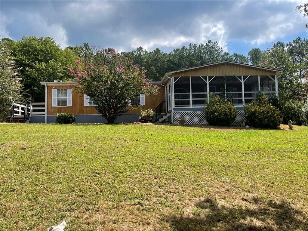 3 bedroom, 2 bathroom single family residence under contract at 74 Bridle Path Drive, Ball Ground, GA 30107 — photo 4
