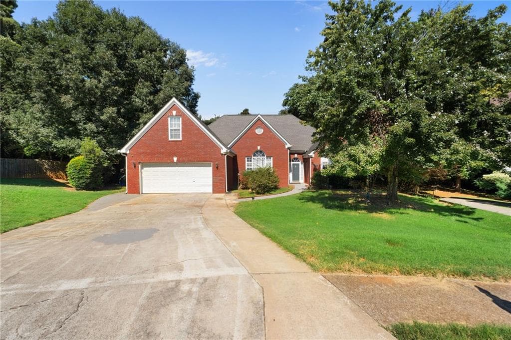 4 bedroom, 3 bathroom, 2,607 sq ft single family residence for sale at 1000 Georgian Hills Dr, Lawrenceville, GA 30045 — photo 3