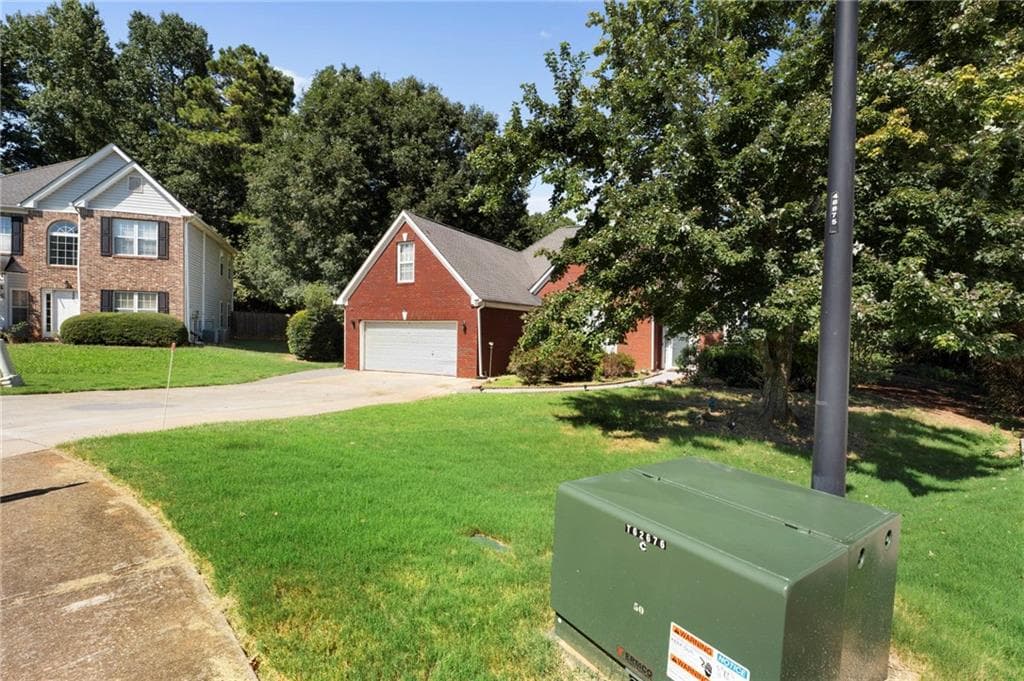 4 bedroom, 3 bathroom, 2,607 sq ft single family residence for sale at 1000 Georgian Hills Dr, Lawrenceville, GA 30045 — photo 4