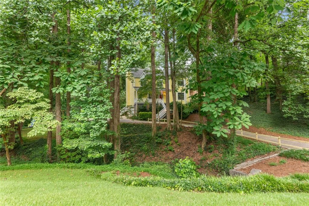 4 bedroom, 4 bathroom, 3,524 sq ft single family residence for sale at 11690 Highland Colony Drive, Roswell, GA 30075 — photo 4