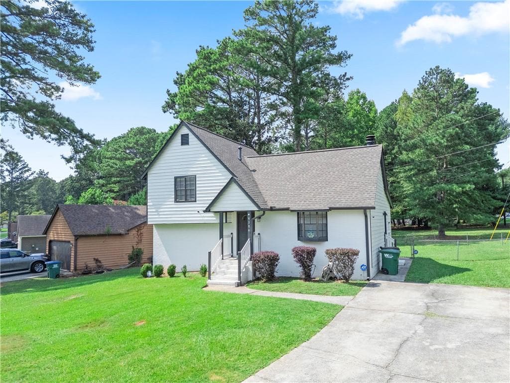 3 bedroom, 2 bathroom, 1,299 sq ft single family residence for sale at 9386 Woodknoll Lane, Jonesboro, GA 30238 — photo 8