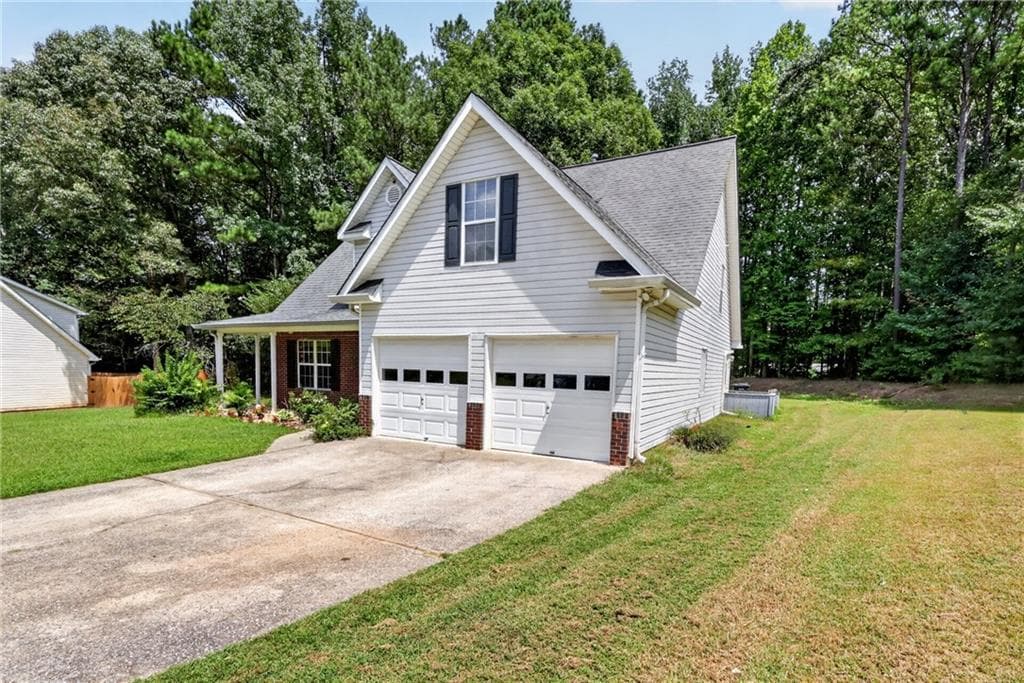 4 bedroom, 3 bathroom, 1,952 sq ft single family residence for sale at 4009 Saint George Walk, Powder Springs, GA 30127 — photo 2