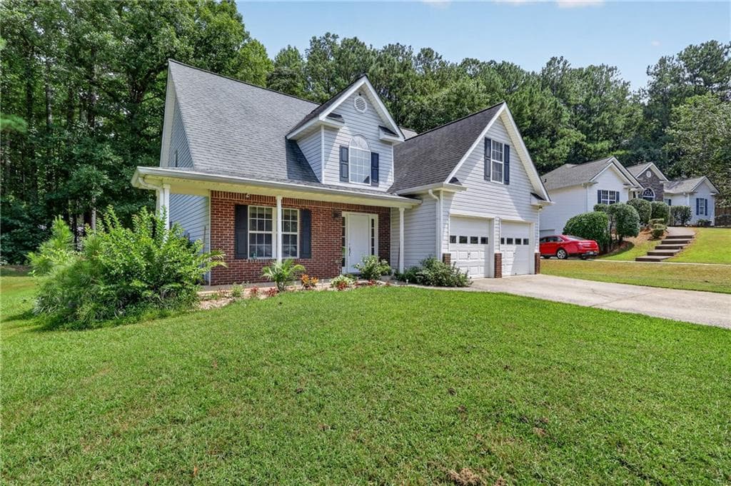 4 bedroom, 3 bathroom, 1,952 sq ft single family residence for sale at 4009 Saint George Walk, Powder Springs, GA 30127 — photo 3