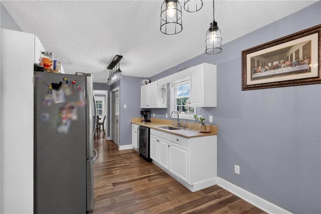 4 bedroom, 3 bathroom, 1,952 sq ft single family residence for sale at 4009 Saint George Walk, Powder Springs, GA 30127 — photo 5