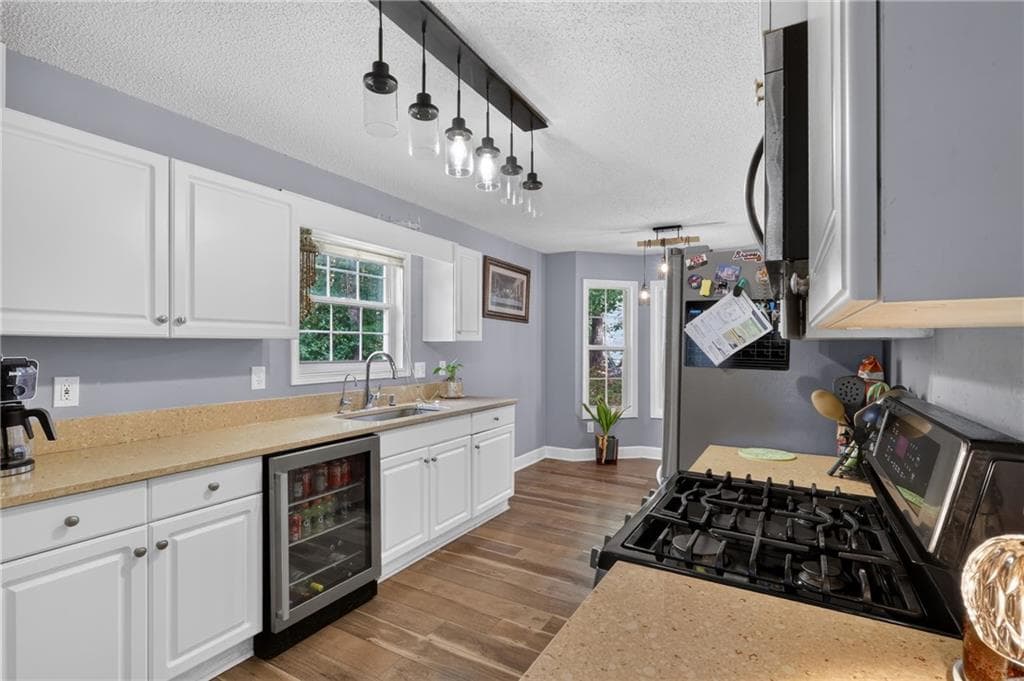 4 bedroom, 3 bathroom, 1,952 sq ft single family residence for sale at 4009 Saint George Walk, Powder Springs, GA 30127 — photo 6