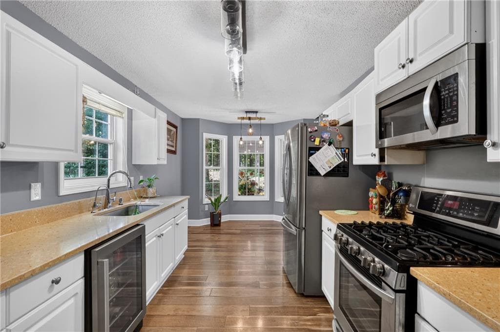 4 bedroom, 3 bathroom, 1,952 sq ft single family residence for sale at 4009 Saint George Walk, Powder Springs, GA 30127 — photo 7