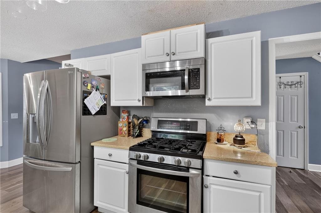 4 bedroom, 3 bathroom, 1,952 sq ft single family residence for sale at 4009 Saint George Walk, Powder Springs, GA 30127 — photo 9