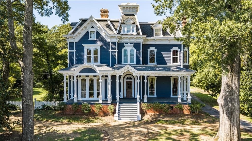 8 bedroom, 7 bathroom, 6,181 sq ft single family residence for sale at 906 E 2nd Avenue, Rome, GA 30161