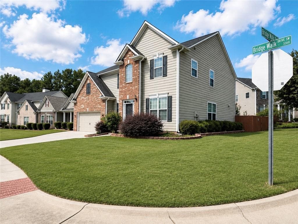 4 bedroom, 3 bathroom, 3,536 sq ft single family residence for sale at 3353 Bridge Walk Drive, Lawrenceville, GA 30044 — photo 2