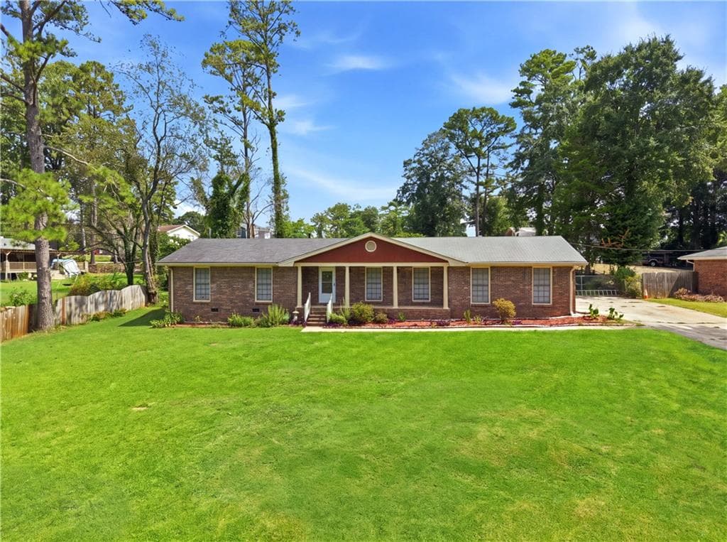 3 bedroom, 2 bathroom, 1,936 sq ft single family residence for sale at 2681 Kings Circle, Lawrenceville, GA 30044