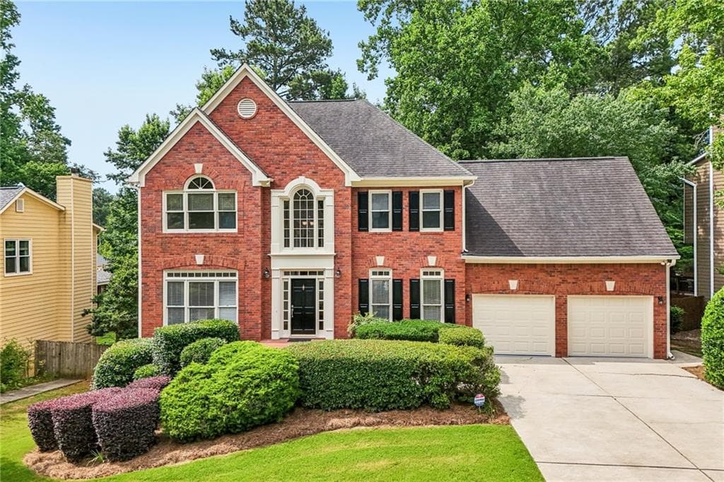 5 bedroom, 4 bathroom, 4,133 sq ft single family residence for sale at 7215 Amberleigh Way, Johns Creek, GA 30097