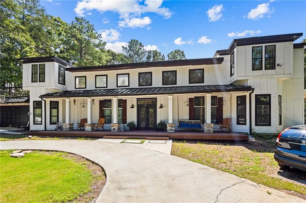 7 bedroom, 5 bathroom, 6,500 sq ft single family residence for sale at 6409 Snelling Mill Road, Flowery Branch, GA 30542