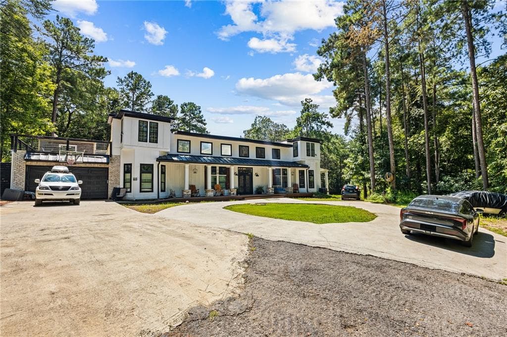 7 bedroom, 5 bathroom, 6,500 sq ft single family residence for sale at 6409 Snelling Mill Road, Flowery Branch, GA 30542 — photo 2