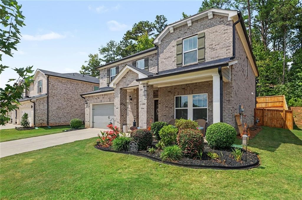 5 bedroom, 3 bathroom, 2,674 sq ft single family residence for sale at 7789 Richmond Trail, Fairburn, GA 30213 — photo 2