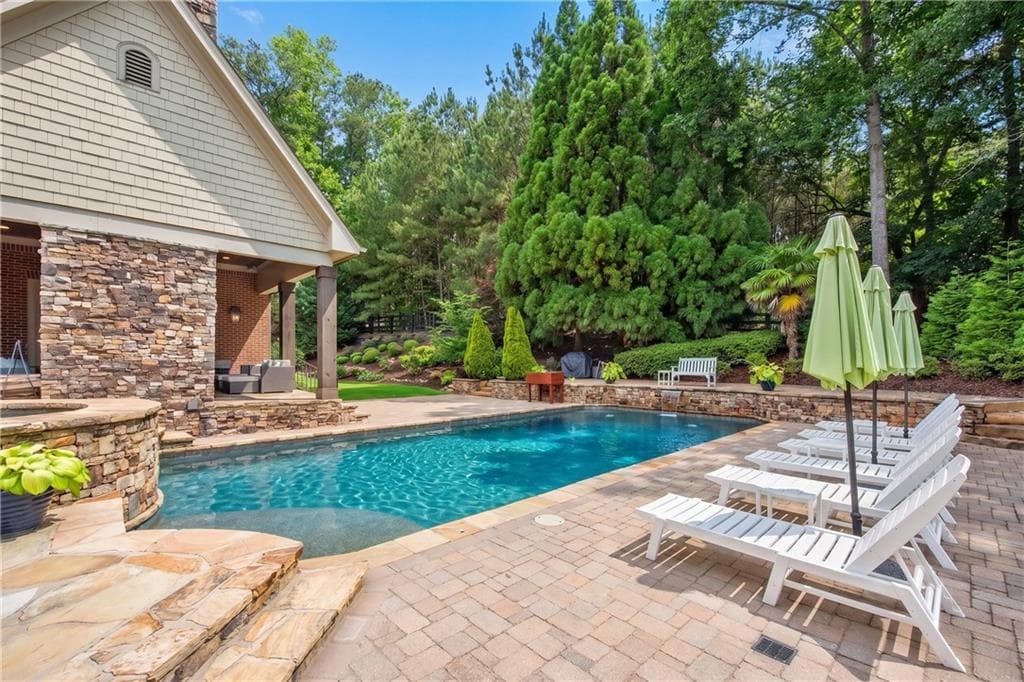 6 bedroom, 7 bathroom, 9,276 sq ft single family residence for sale at 13942 Tree Loft Road, Milton, GA 30004 — photo 2