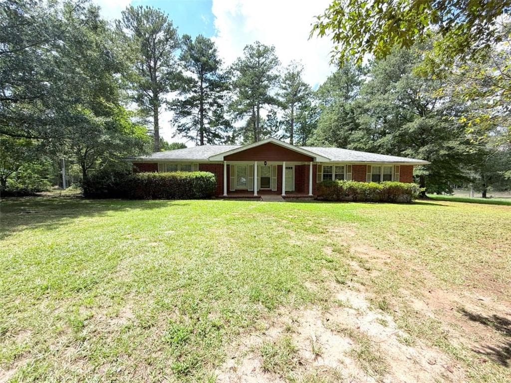 3 bedroom, 2 bathroom, 1,909 sq ft single family residence for sale at 1571 Ebenezer Road, Conyers, GA 30094 — photo 2