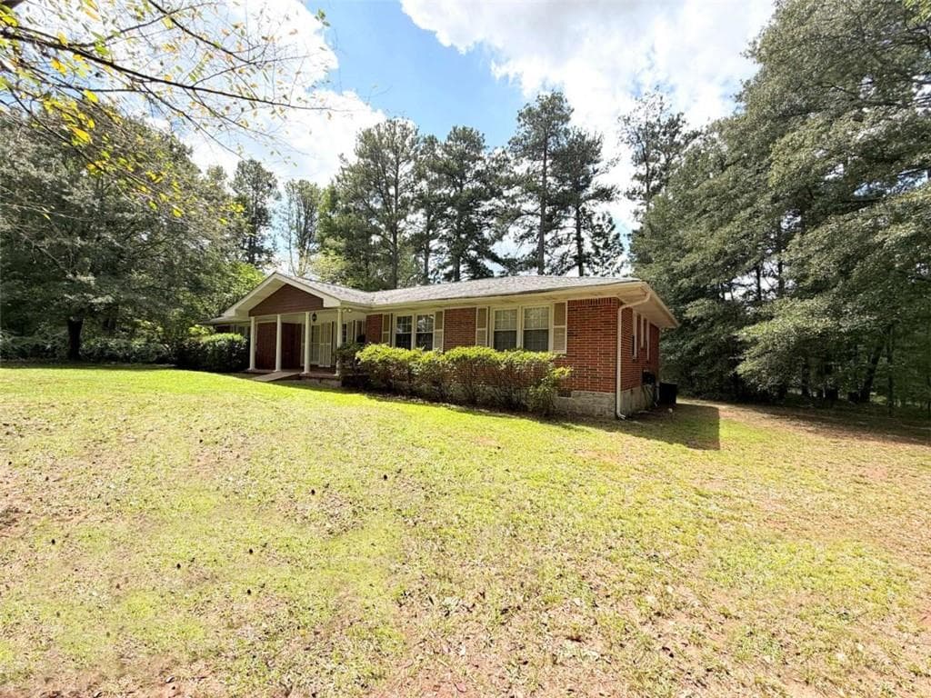 3 bedroom, 2 bathroom, 1,909 sq ft single family residence for sale at 1571 Ebenezer Road, Conyers, GA 30094 — photo 4