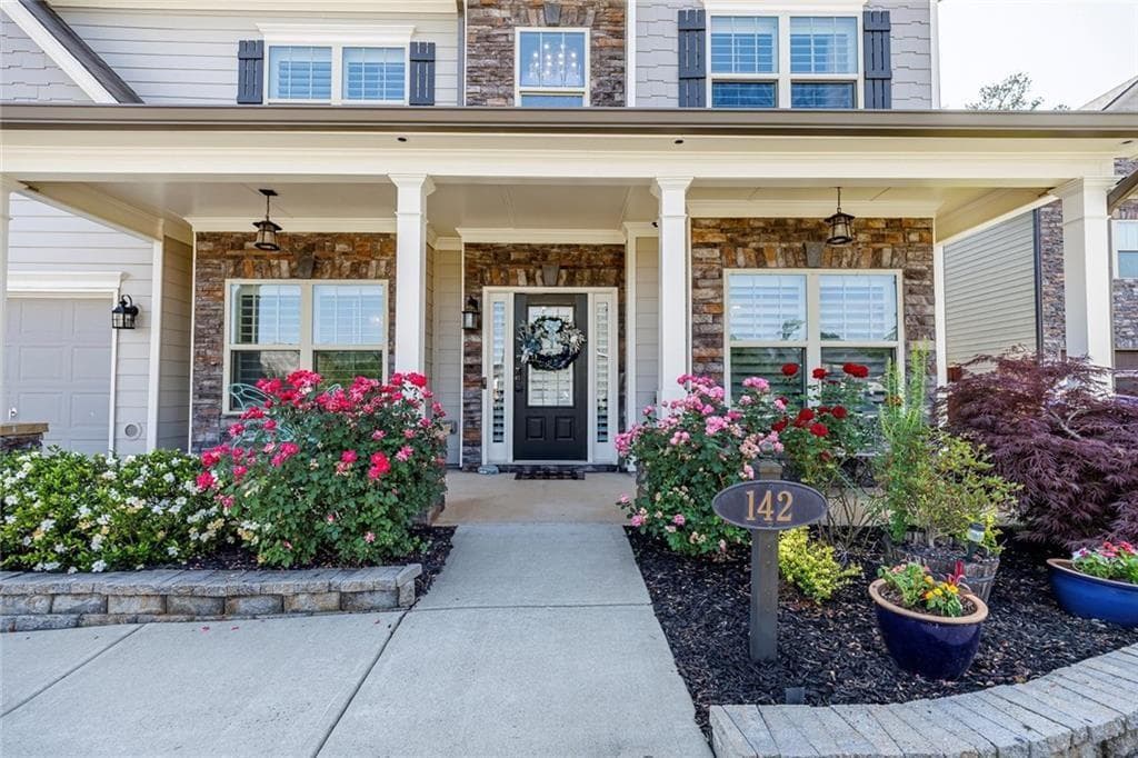 7 bedroom, 5 bathroom, 4,746 sq ft single family residence for sale at 142 Madison Street, Canton, GA 30115 — photo 2