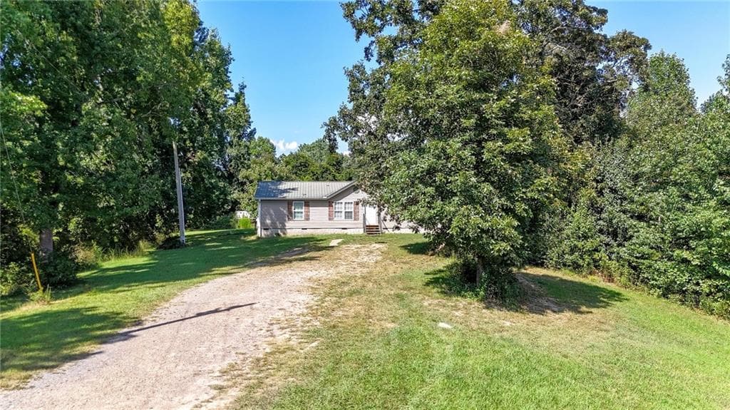 4 bedroom, 2 bathroom, 1,404 sq ft single family residence for sale at 4382 Dews Pond Road, Calhoun, GA 30701 — photo 4