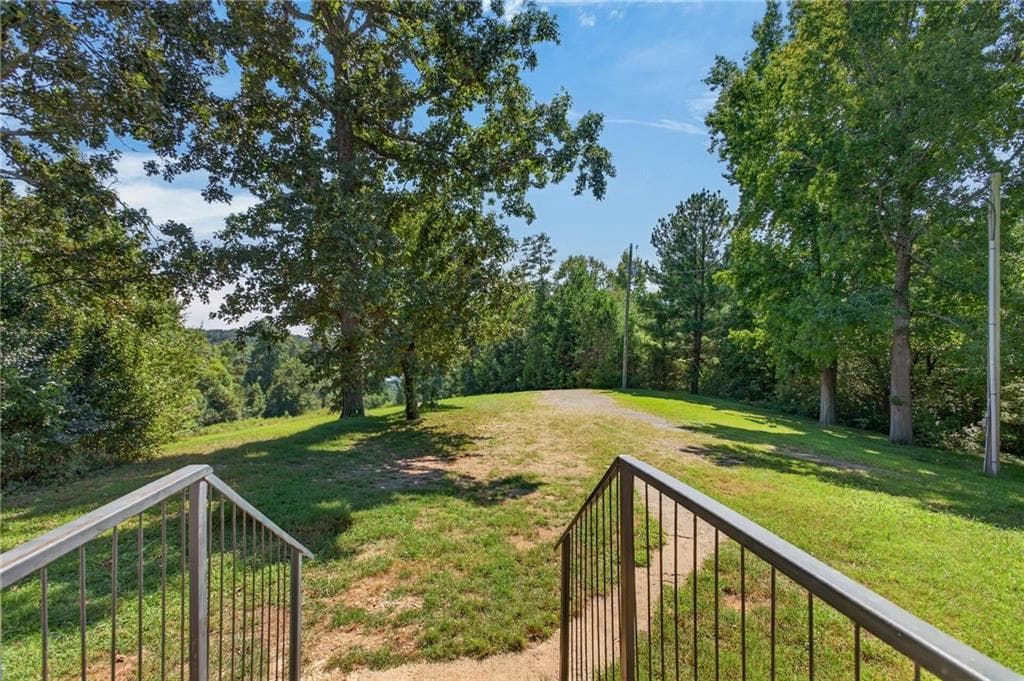 4 bedroom, 2 bathroom, 1,404 sq ft single family residence for sale at 4382 Dews Pond Road, Calhoun, GA 30701 — photo 6