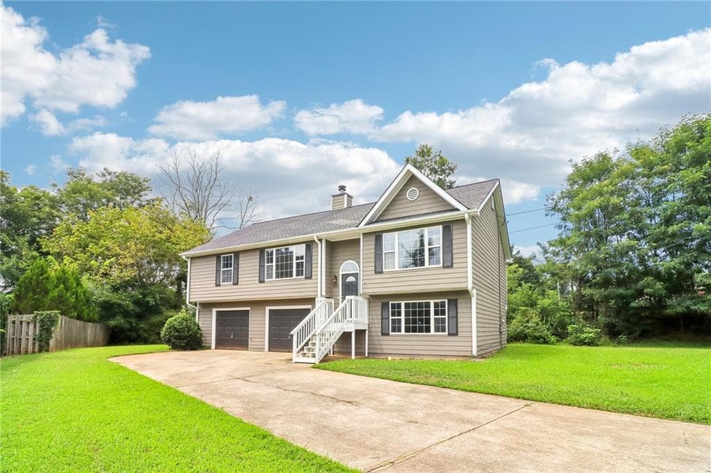 4 bedroom, 2 bathroom, 1,558 sq ft single family residence for sale at 2896 Emory Road, Smyrna, GA 30080 — photo 2