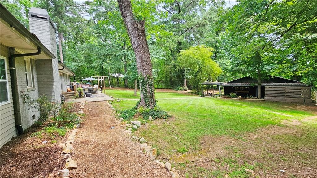 4 bedroom, 3 bathroom, 2,340 sq ft single family residence for sale at 1581 Lost Mountain Road, Powder Springs, GA 30127 — photo 5