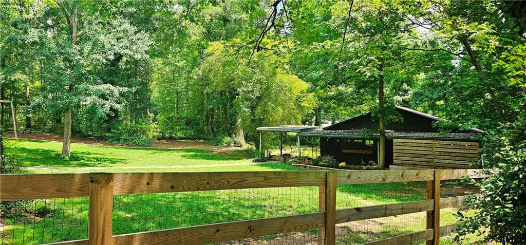 4 bedroom, 3 bathroom, 2,340 sq ft single family residence for sale at 1581 Lost Mountain Road, Powder Springs, GA 30127 — photo 4