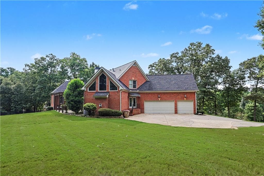 7 bedroom, 6 bathroom, 7,650 sq ft single family residence for sale at 8415 Glen Lake Drive, Cumming, GA 30028 — photo 6