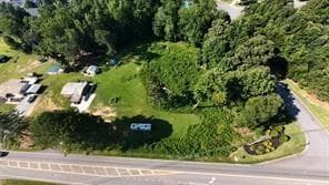 3 bedroom, 2 bathroom, 1,120 sq ft single family residence for sale at 4060 Jot Em Down Road, Cumming, GA 30028 — photo 1 of 4