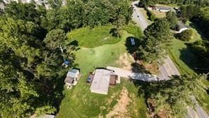 3 bedroom, 2 bathroom, 1,120 sq ft single family residence for sale at 4060 Jot Em Down Road, Cumming, GA 30028 — photo 3