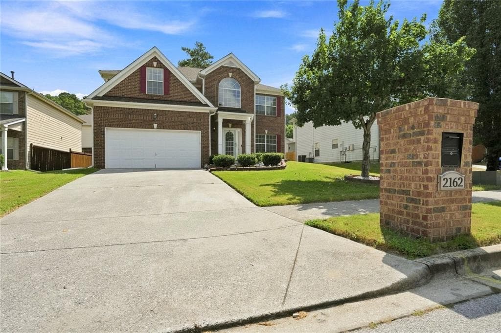 4 bedroom, 3 bathroom, 2,770 sq ft single family residence for sale at 2162 Poplar Falls Avenue, Lithonia, GA 30058 — photo 2